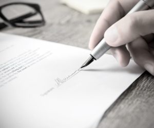 Podpisanie dokumentu jakim jest umowa przedwstępna zakupu nieruchomości